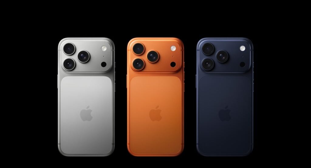 Linha iPhone 17 nas cores cinza, laranja e preto, lado a lado.